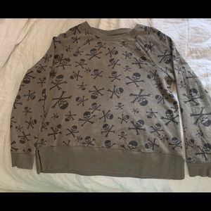 preppy style green skull sweater.